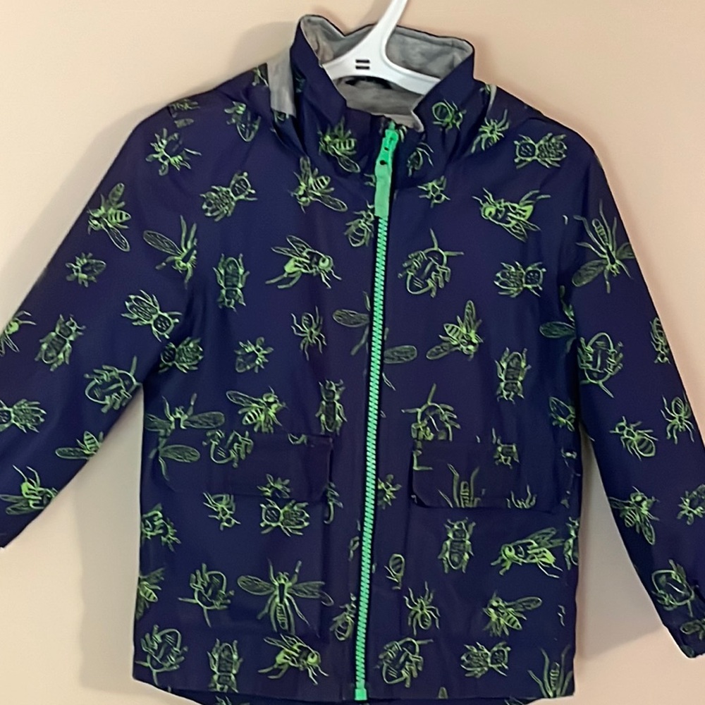 3T navy raincoat with fun insect pattern and hood.